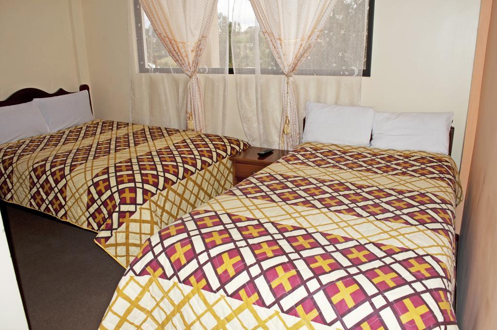 Hotel Residencial El Viajero Tababela Quarto foto